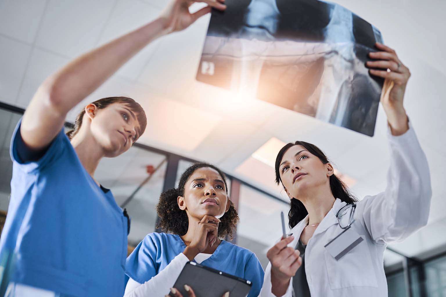 shot of a group of doctors discussing the results